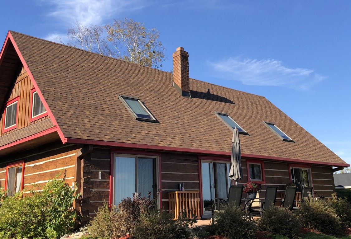 House exterior roofing and siding project by Perfect Choice Roofing